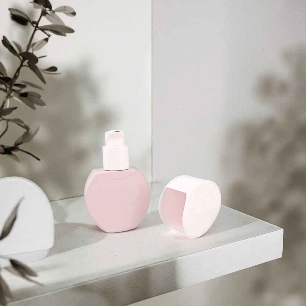 Pink foundation bottle with pump and matching cap for skin tint packaging